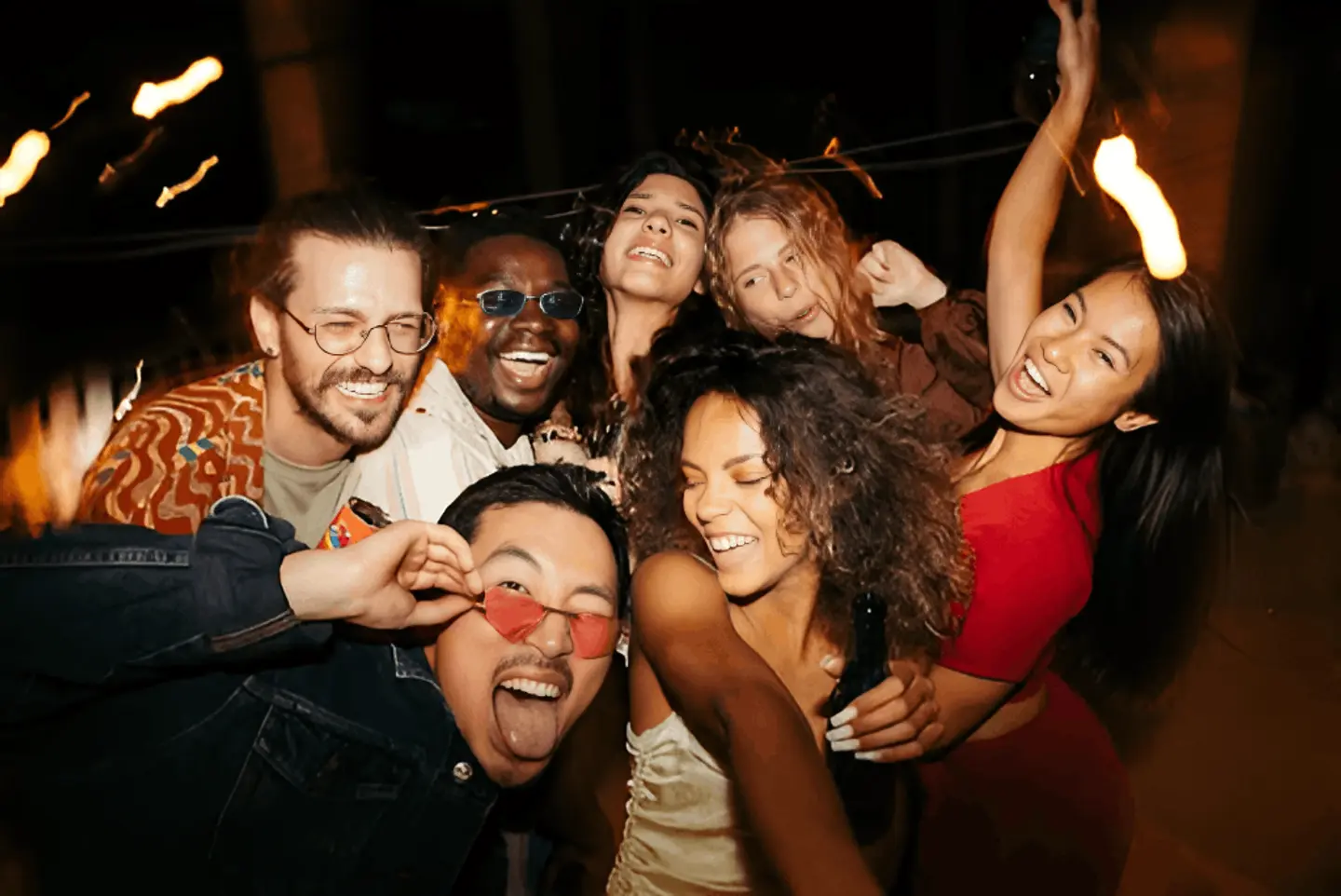 A group of friends enjoying their time in of the best nightlife spots in Cancun.