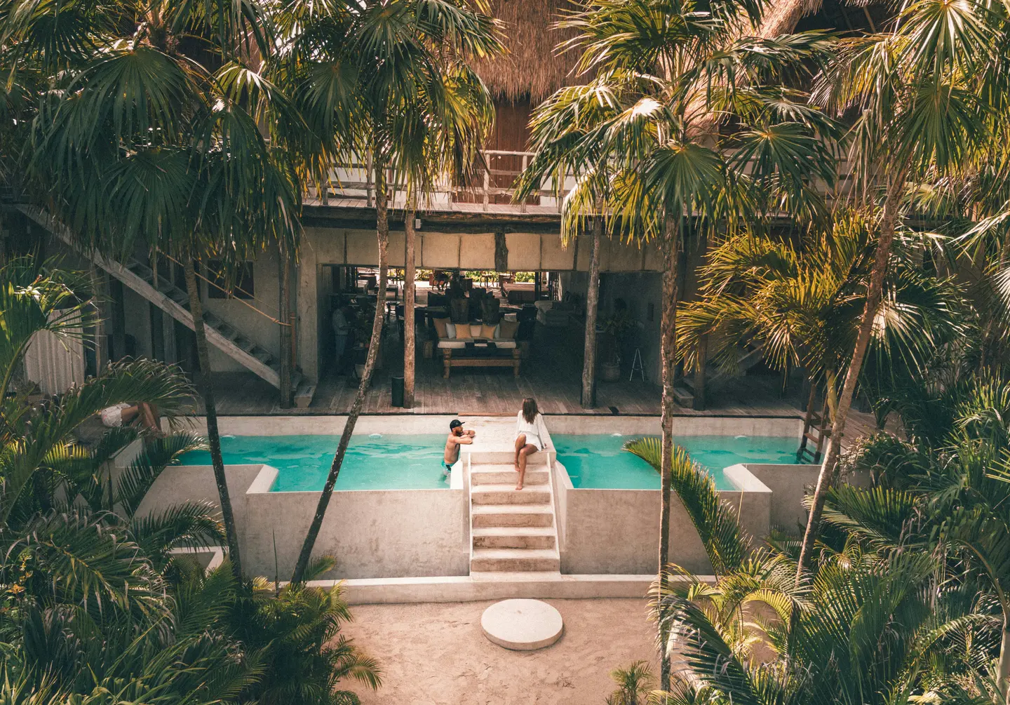 Happy client and her investment in Tulum