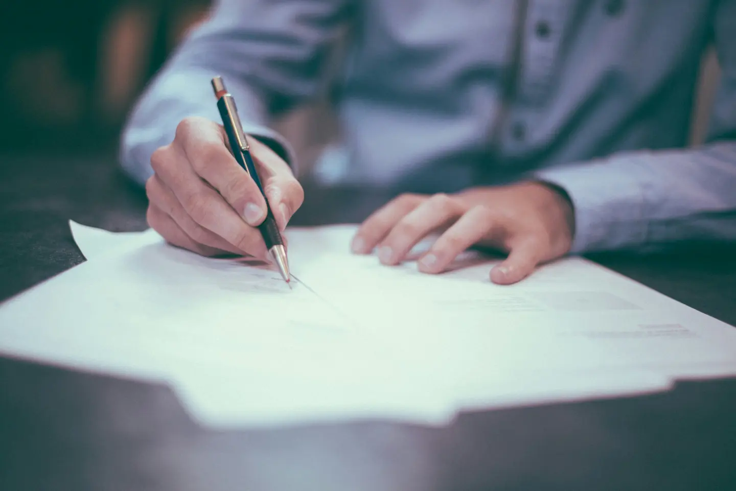 Signature of Property Deed at the Notary in Mexico